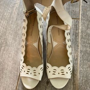White wedge dress shoes.